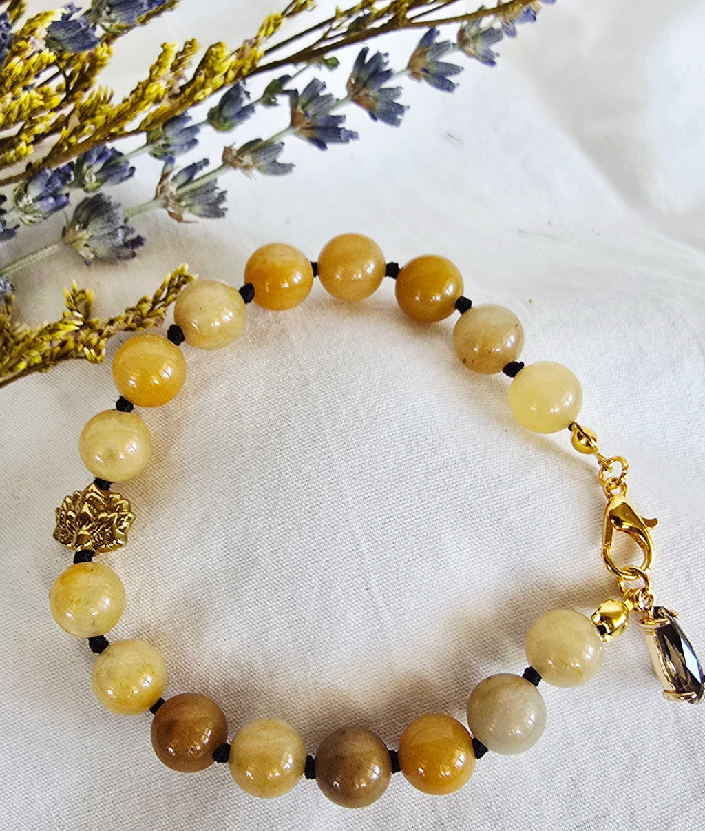 Hand-Knotted Yellow Jade Bracelet with Gold Lotus Bead
