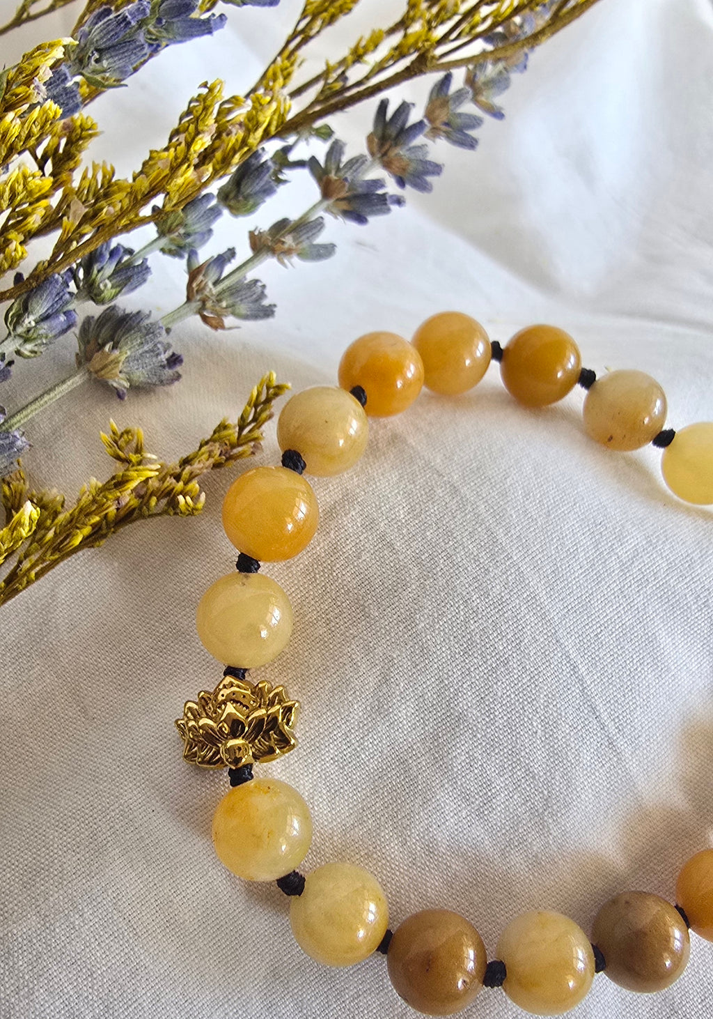 Hand-Knotted Yellow Jade Bracelet with Gold Lotus Bead